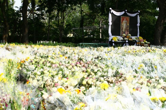 Piles of flowers at Saranrom Park on Wednesday
