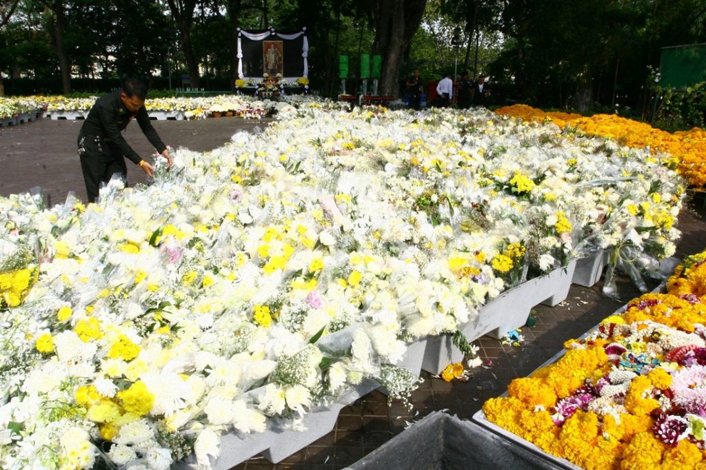 Piles of flowers at Saranrom Park on Wednesday