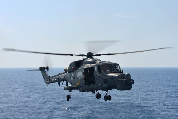 A Royal Malaysian Navy Super Lynx prepares to land on the flight deck of USS Freedom during deck landing qualifications in 2013 in the South China Sea. Photo: Cooperation Afloat Readiness and Training (CARAT) / Flickr