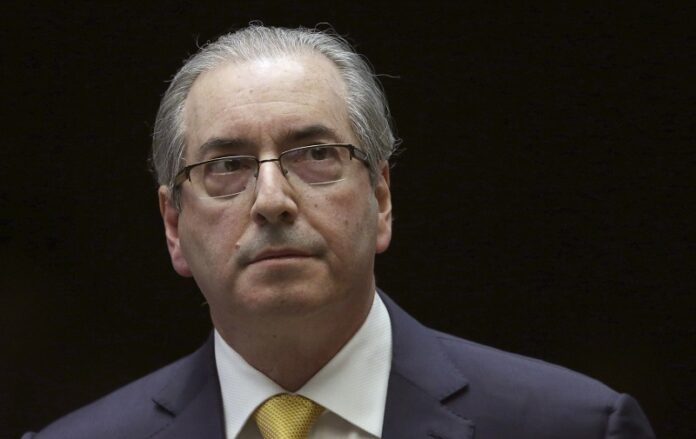 Brazil's former President of the Chamber of Deputies Eduardo Cunha takes a break during the presentation of his defense in the Chamber of Deputies Sept. 12 in Brasilia, Brazil. Photo: Eraldo Peres / Associated Press