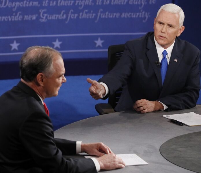 Republican vice-presidential nominee Gov. Mike Pence, right, and Democratic vice-presidential nominee Sen. Tim Kaine debate Tuesday during the vice-presidential debate at Longwood University in Farmville, Virginia. Photo: Andrew Gombert / Associated Press
