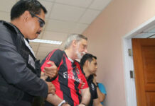 Police Say American Admits Cutting Up Victim, Denies Killing Him