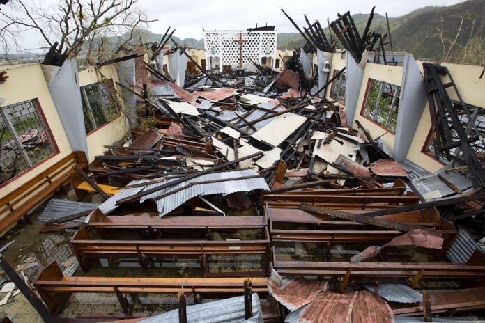 Saint Anne church lays totally destroyed by Hurricane Matthew Thursday in Camp Perrin, a district of Les Cayes, Haiti. Photo: Dieu Nalio Chery / Associated Press