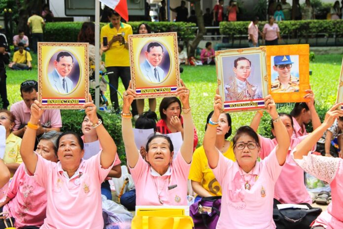 Well-wishers gather for a second day on Thursday to pray for King Bhumibol at Siriraj Hospital in Bangkok.