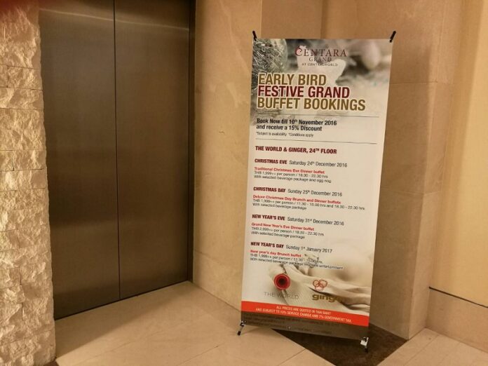 An advertising board for end of year festivities is shown Saturday at the Centara Grand Hotel in Bangkok.