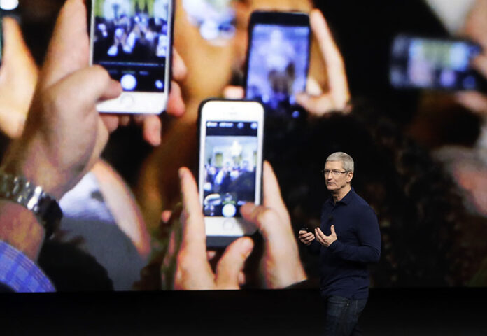 Apple CEO Tim Cook announces the new iPhone 7 during an event to announce new products on Sept. 7 in San Francisco. Photo: Marcio Jose Sanchez / Associated Press