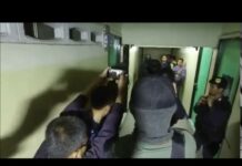 Police Put Calm Face on Raids Throughout Capital (Video)