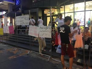 Vendors protest Wednesday evening at Siam Square in Bangkok.