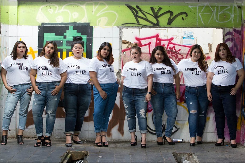 Fourth from left, Kewalin ‘Golf’ Kowhakul, owner of Fashion Killer, and her crew poses in August. Photo: Fashion Killer / Facebook