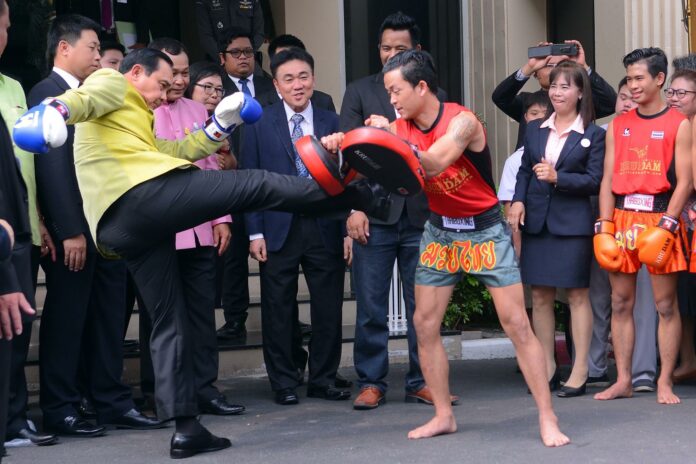 Prime Minister Prayuth Chan-ocha shows off his Muay Thai skill in March at Government House.