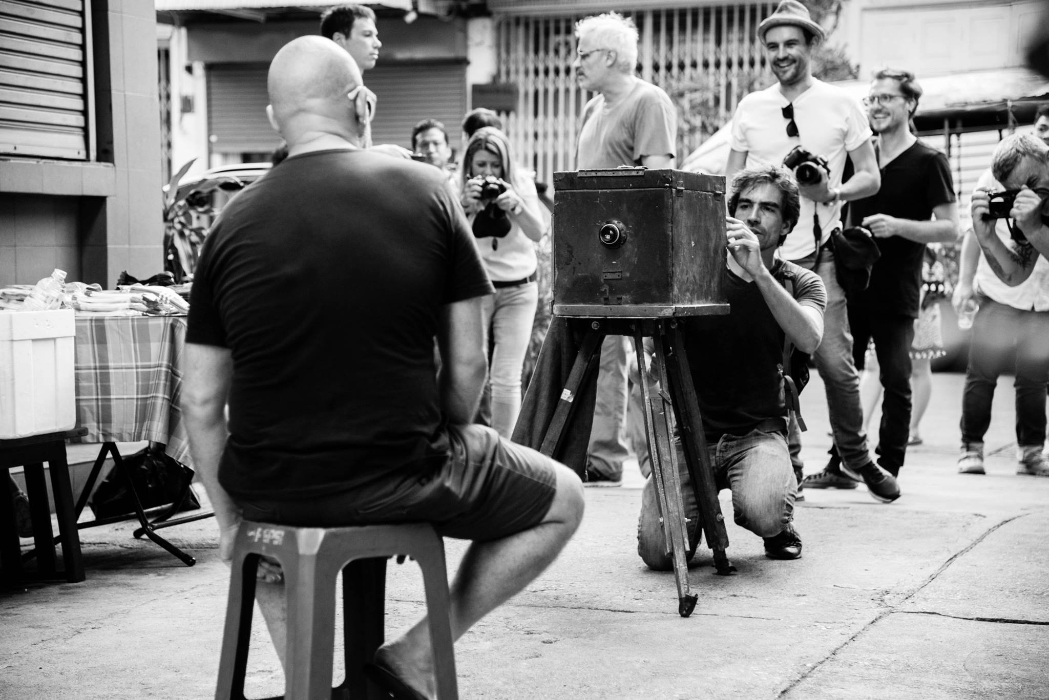 Landry Dunand takes a portrait with a camera obscura from Afghanistan in Bangkok’s Chinatown in an undated photo file. Photo: Thitiwat Pob Apichaikittiwut / Facebook