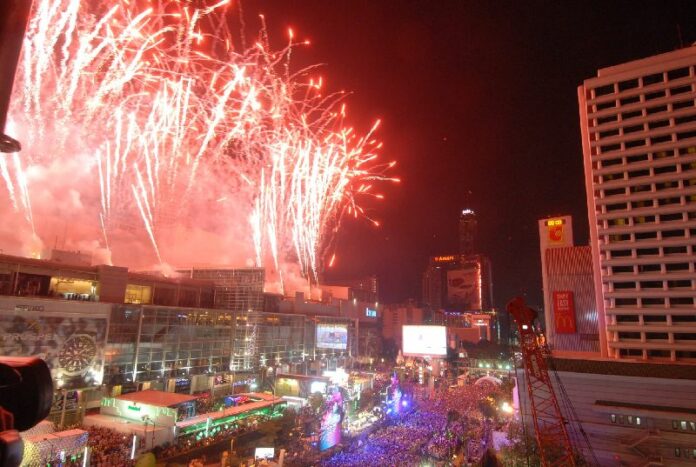 Fireworks greet the arrival of the year 2015 after the clock strikes midnight on Jan. 1, 2015, at Central World shopping mall in Bangkok