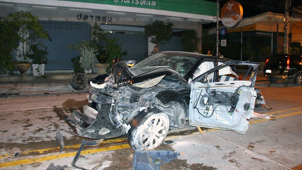 Wreckage of a Land Rover after it crashed into the back of a truck early Thursday morning in Chonburi