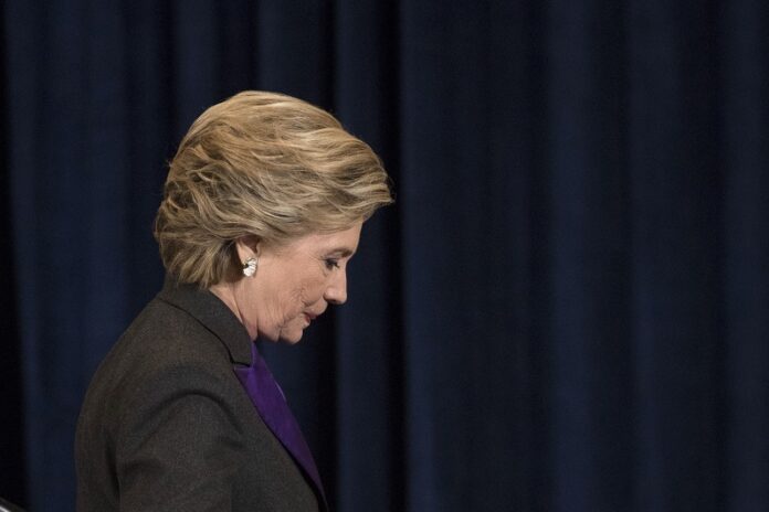 Democratic presidential candidate Hillary Clinton walks off the stage after speaking Wednesday in New York. Photo: Matt Rourke / Associated Press