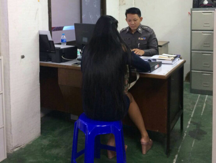 The ‘ghost rider’ turns herself in for clinging to a moving vehicle Thursday afternoon at the Hua Mak Police Station.