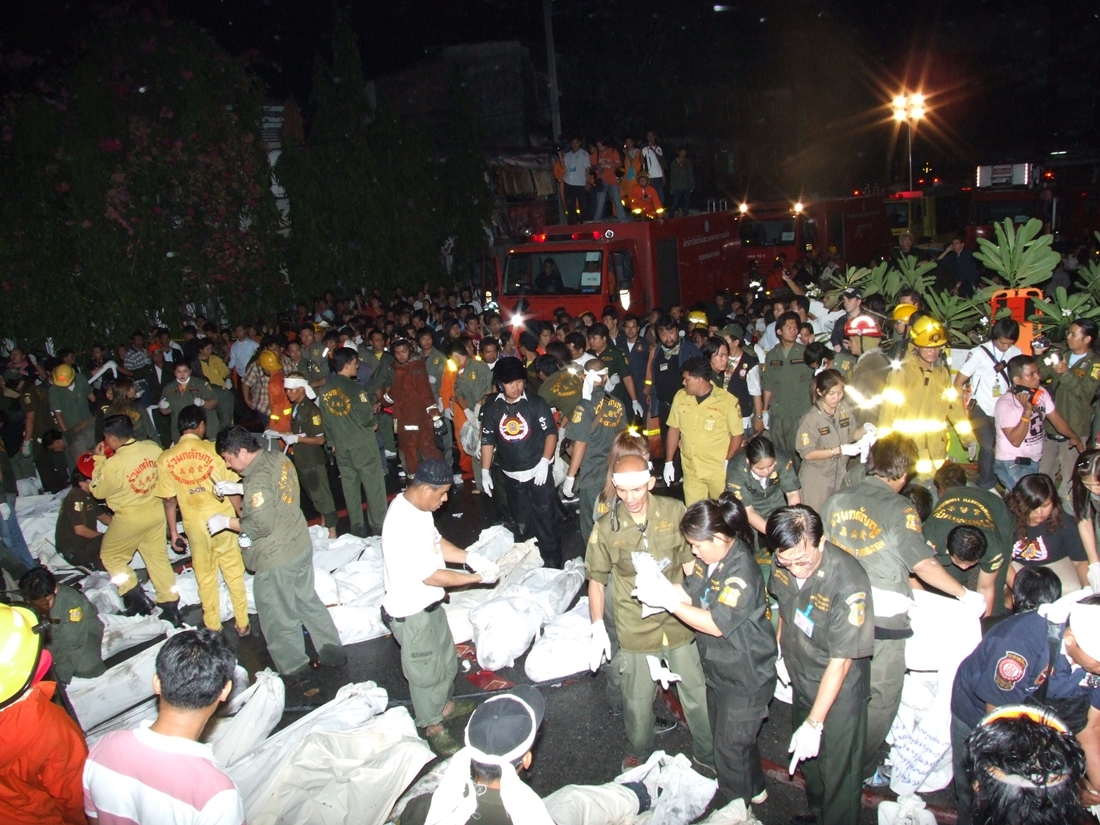 Rescue workers at the scene of the Santika nightclub fire on Jan. 1, 2009.