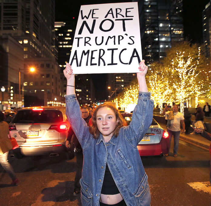 Protesters unhappy with election of Donald Trump block traffic on JFK Boulevard Thursday in Philadelphia. Photo: Charles Fox / The Philadelphia Inquirer / Associated Press