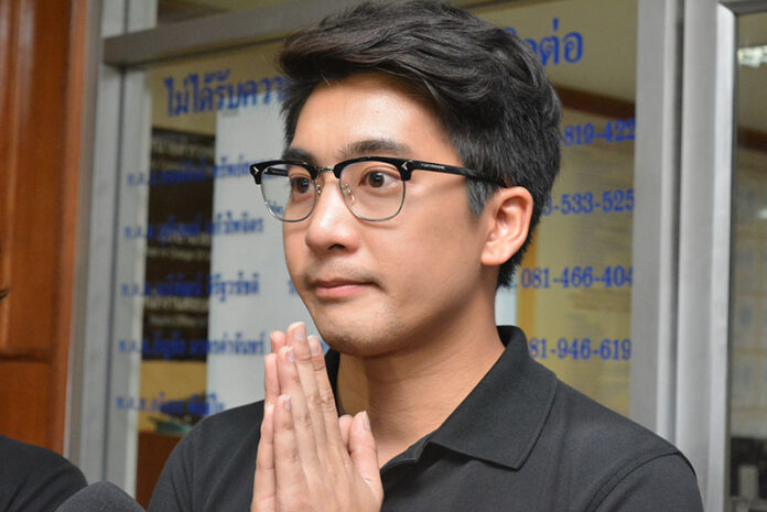 Acharanat Ariyaritwikol at police station on Sunday.