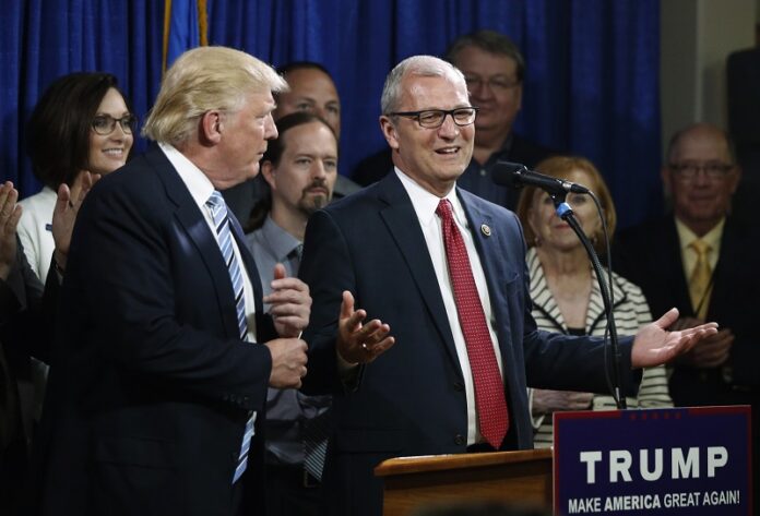 U.S. Rep. Kevin Cramer, R-N.D., right, talks about being one of the first to endorse then Republican presidential candidate Donald Trump in May during the North Dakota Republican National Convention in Bismarck. Photo: Charles Rex Arbogast / Associated Press