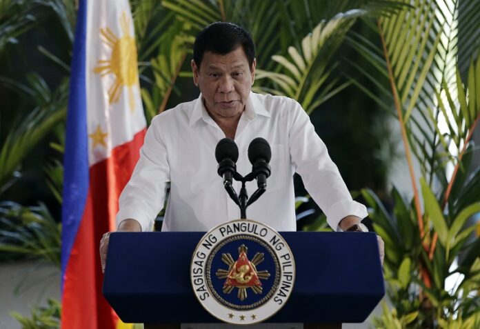 Philippine President Rodrigo Duterte delivers his speech during departure ceremonies last November at Manila's International Airport, Philippines. Photo: Aaron Favila / Associated Press