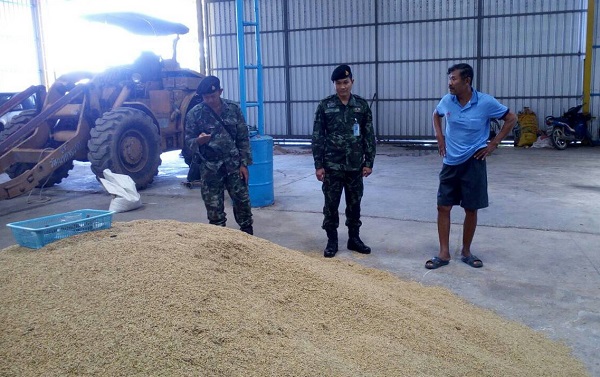 Soldiers inspect a mill in Phichit province in the north of Bangkok Wednesday. 