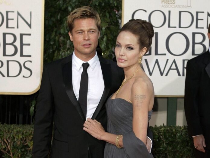 Actor Brad Pitt and actress Angelina Jolie arrive for the 64th Annual Golden Globe Awards in 2007 in Beverly Hills, California. Photo: Mark J. Terrill / Associated Press