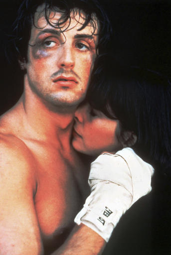 Actor and screenwriter Sylvester Stallone holds actress Talia Shire in a scene from the 1976 movie "Rocky."(AP)