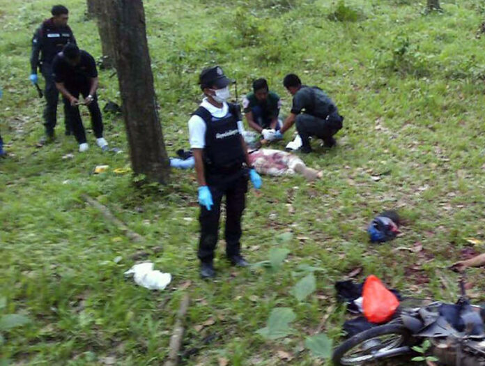Security forces secure the scene where two suspected insurgents were killed in another attack Friday in Yala province.