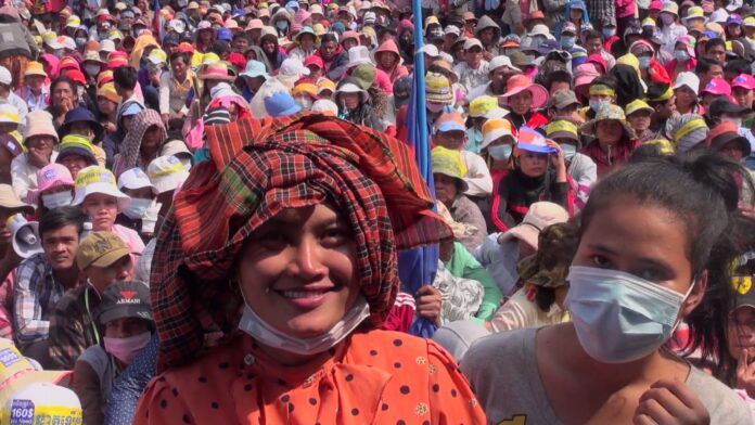 A screenshot from trailer showing Cambodian people gathering in a protest to oust PM Hun Sen