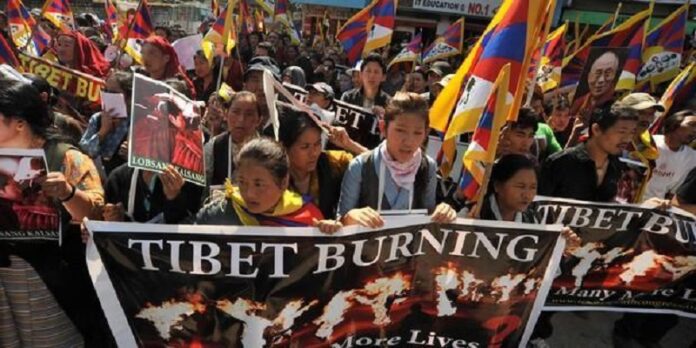 Tibetans protest Chinese rule in 2014 as a result of another case of self-immolation by student Lhamo Tashi in Tsoe city, Kanlho, in what was then the 138th case since 2009. Photo: Day Donaldson / Associated Press