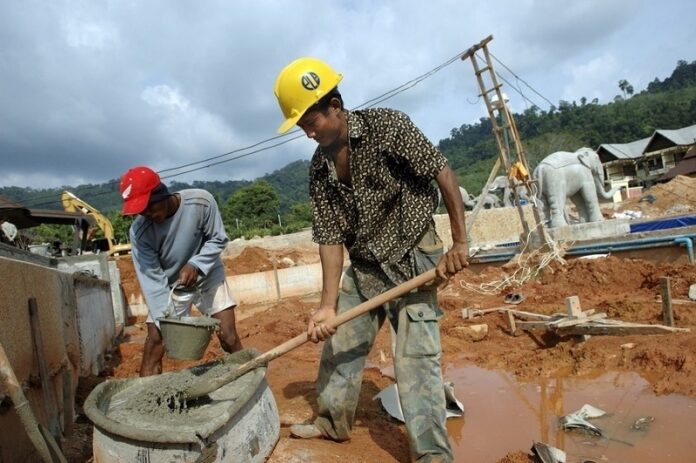 Burmese migrants work in construction projects in Phang Nang. Photo: IOM / Courtesy