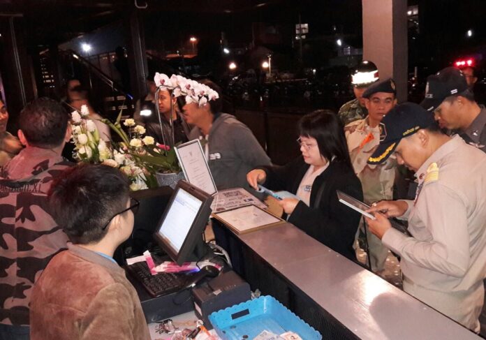 Security officers raid a bar Tuesday in Chiang Rai city for offering a 190 baht all-you-can-drink happy hour special.