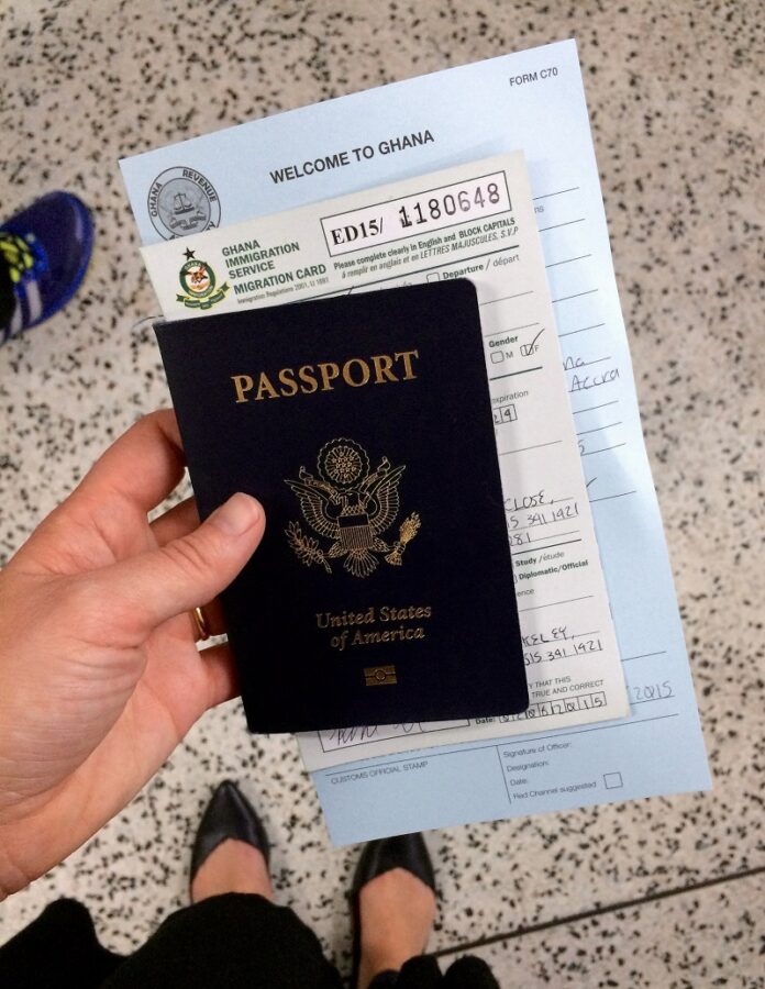 A US passport with Ghanaian arrival documents shown here in 2015 in Accra, Ghana. Photo: Rachel Strohm / Flickr
