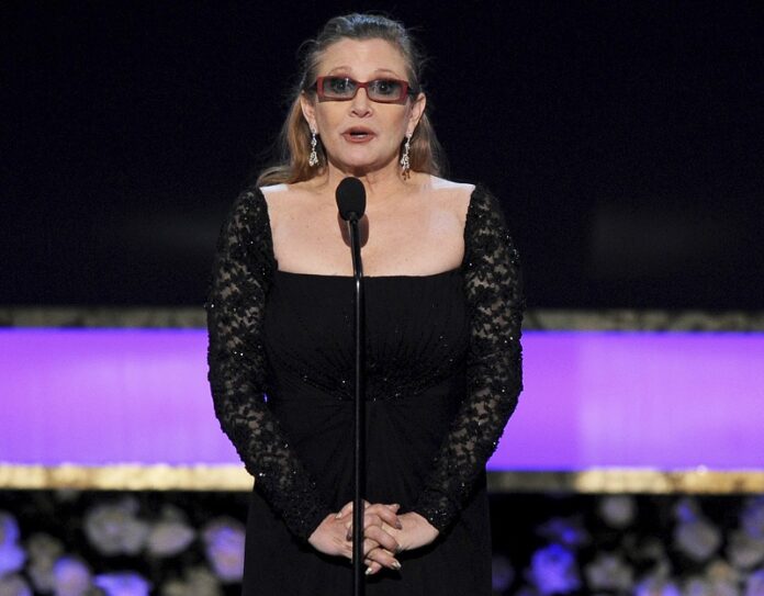 Carrie Fisher in a 2015 photo file presenting the life achievement award on stage at the 21st annual Screen Actors Guild Awards at the Shrine Auditorium in Los Angeles. Photo: Bucci / Invision / AP, File