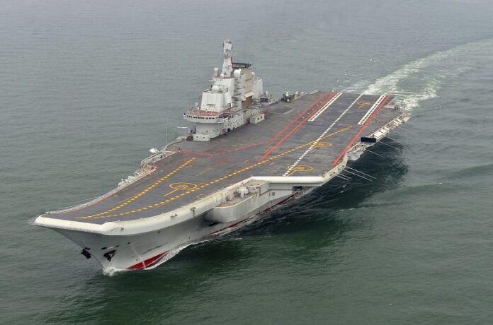 Chinese aircraft carrier Liaoning cruises for a test in the sea in 2012. Photo: Li Tang / Associated Press
