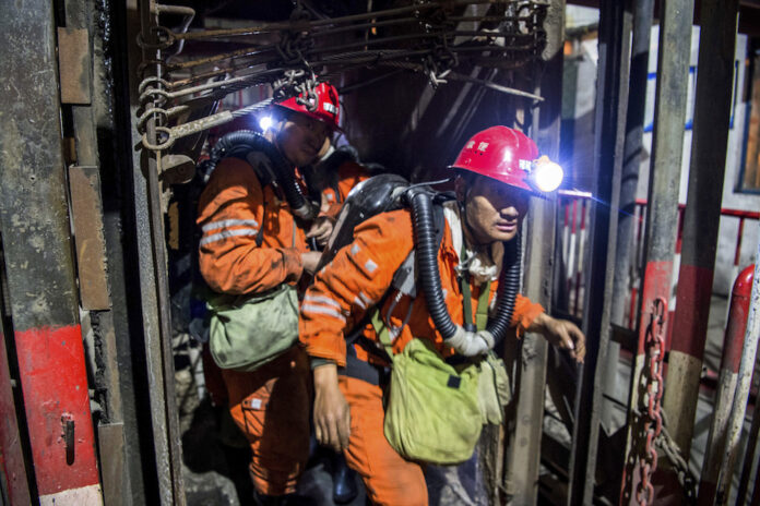Rescuers entering the accident site to conduct search and rescue operation at the mining company in Chifeng, north China's Inner Mongolia Autonomous Region. Photo: Lian Zhen/Xinhua via AP
