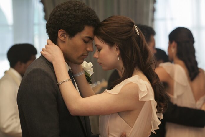 This image released by Netflix shows Devon Terrell as Barack Obama, left, and Anya Taylor-Joy as Charlotte, in a scene from
