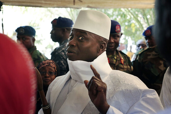 Gambia's president Yahya Jammeh shows his inked finger Dec. 1 before voting in Banjul, Gambia. Photo: Jerome Delay / Associated Press