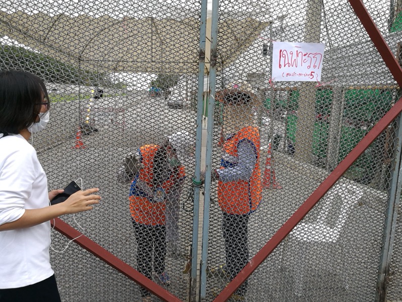 Closely guarded entrance near Master Nun Chand Refectory where many devotees were gathering Friday.