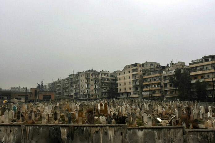 This photo released by the Syrian official news agency SANA, shows a graveyard in east Aleppo, Syria, Dec. 13, 2016. Syrian rebels said Tuesday that they reached a cease-fire deal with Moscow to evacuate civilians and fighters from eastern Aleppo, after the U.N. and opposition activists reported possible mass killings by government forces closing in on the rebels' last enclave. Photo: AP