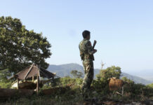 Rights Group Sees Blocked Aid to Myanmar Kachin as War Crime A soldier in 2016 patrols the front line near Laiza, the headquarters of the Kachin Independence Army (KIA) in Kachin State, Myanmar. Photo: Esther Htusan / Associated Press