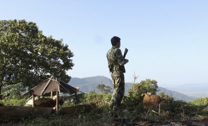 A soldier in 2016 patrols the front line near Laiza, the headquarters of the Kachin Independence Army (KIA) in Kachin State, Myanmar. Photo: Esther Htusan / Associated Press