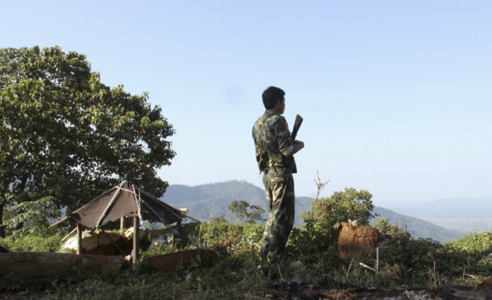 A soldier in 2016 patrols the front line near Laiza, the headquarters of the Kachin Independence Army (KIA) in Kachin State, Myanmar. Photo: Esther Htusan / Associated Press A soldier in 2016 patrols the front line near Laiza, the headquarters of the Kachin Independence Army (KIA) in Kachin State, Myanmar. Photo: Esther Htusan / Associated Press
