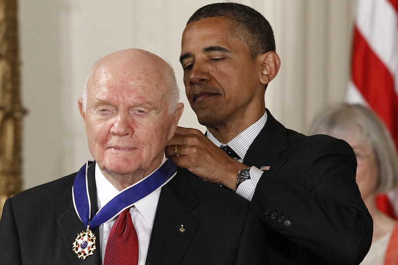 President Barack Obama awards the Medal of Freedom to former astronaut John Glenn in 2012 during a ceremony in the East Room of the White House in Washington. Photo: Charles Dharapak / Associated Press