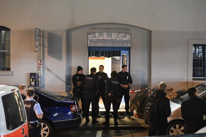 Police secure the area Monday in front of the Islamic center, in Zurich. Photo: Ennio Leanza / Associated Press