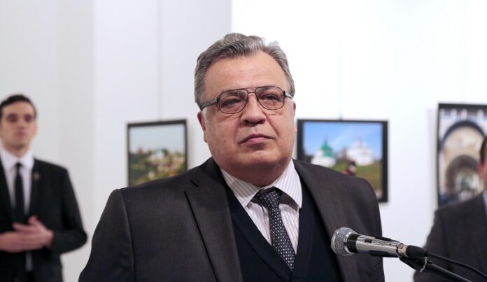 Andrei Karlov, the Russian Ambassador to Turkey, pauses during a speech at a photo exhibition in Ankara on Monday, Dec. 19, 2016, moments before a gunman opened fire on him. Karlov was rushed to a hospital after the attack and later died from his gunshot wounds. Photo: Burhan Ozbilici / Associated Press