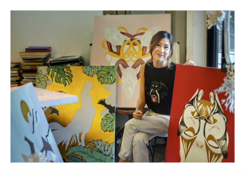 Tachamapan “Pomme Chan” Chanchamrassang with her works. Photo: The Jam Factory Gallery / Courtesy.