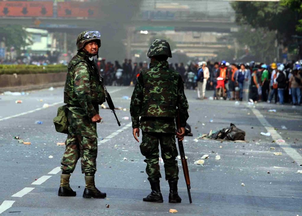 Soldiers face off with Redshirt protesters May 14, 2010, in Bangkok. The protest was eventually crushed by a bloody military crackdown. 