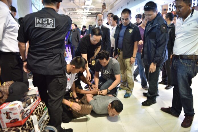 Police on Thursday arrest alleged Laotian druglord Xayasana Keopimpha shortly after landing at Suvarnabhumi Airport