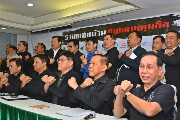 Representatives from 30 media associations gather on Sunday to voice their opposition to a new media law that would require all reporters to have licences.